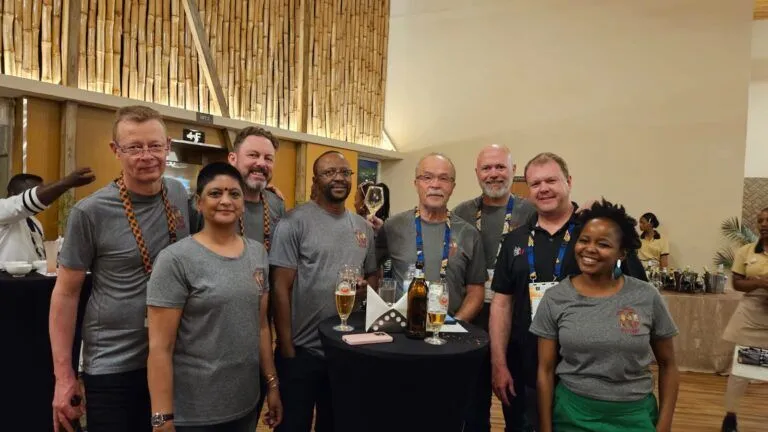 Full group photo of the ZACR 10-year celebration at ICANN80 in Kigali, July 2024, published on the Registry Africa website. The image shows South African registry owners and aligned African participants, with no AUC representatives or original .africa pioneers present.